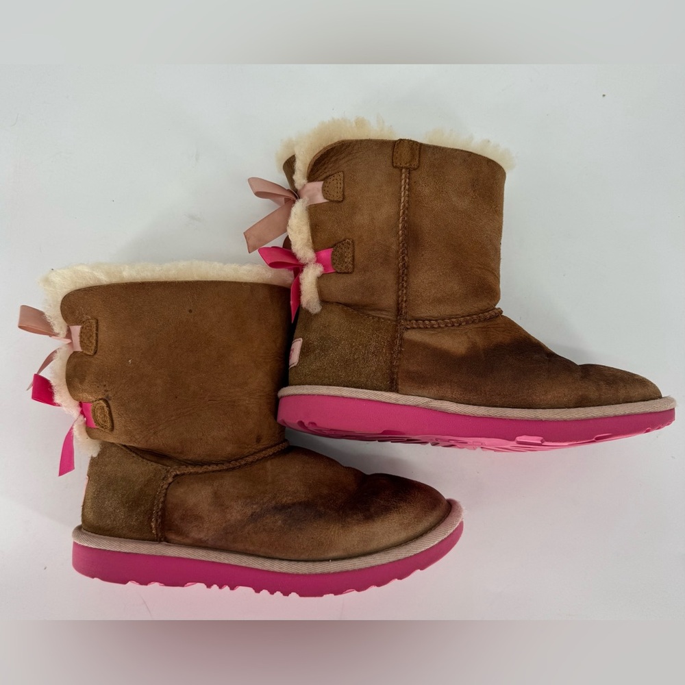 UGG Kids Brown Suede Boots with Pink Soles and Bows - Picture 2 of 7